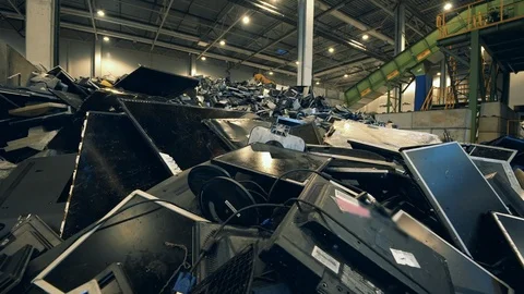 Discarded computer monitors in an indoors dumpsite Stock Footage 127416163