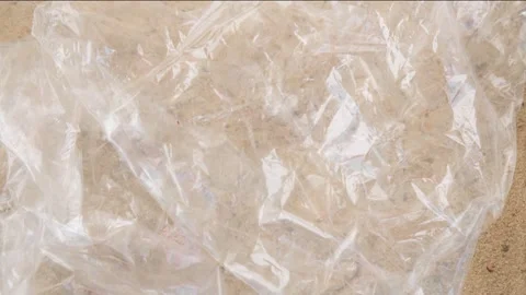 Discarded plastic bag on sandy bottom of sea or ocean. Problem of water pol.. Stock Footage 255366780