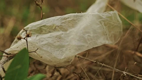Discarded Plastic Trash and Debris in Rural Field 7 Stock Footage 346701055
