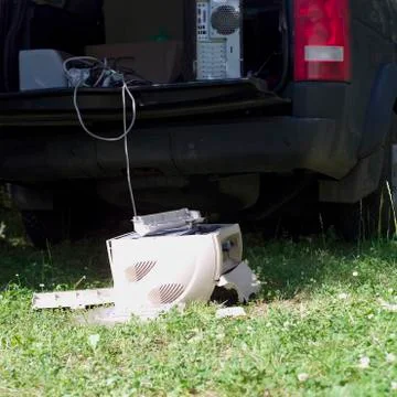 Discarded printer dropped on the ground 写真素材