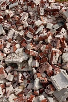 Discarded Red Bricks Are Piled High At Demolition Site Stock Photos