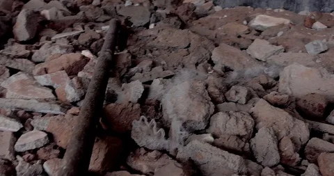 Discarded rusty iron point crow bar / pry bar / gunapam, concrete breaking Stock Footage 118431605