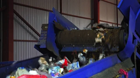 Discarded trash on a factory conveyor. Stock Footage 112411253