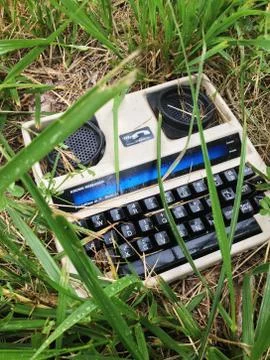 Discarded vintage electronics in grass Stock Photos
