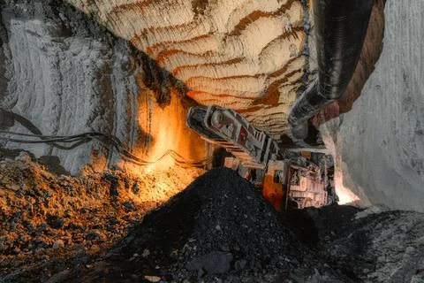 Discharge conveyor of a roadheader. Underground mining of ore deposits Stock Photos