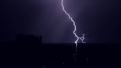 Discharge of linear lightning from different directions in the night sky Stock Footage 93792999