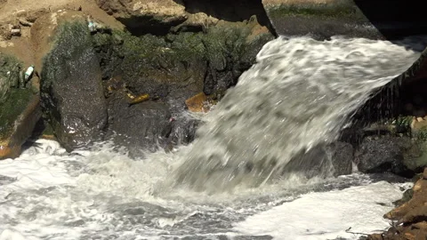 Discharge of sewage into the environment with large pipes Video stock 248257515