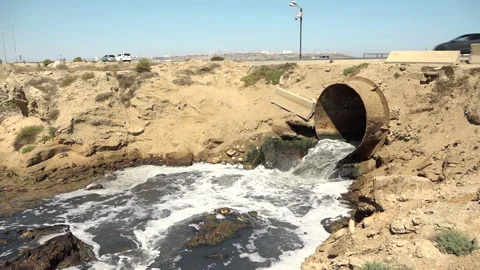 Discharge of sewage into the environment with large pipes Stock Footage 248257525