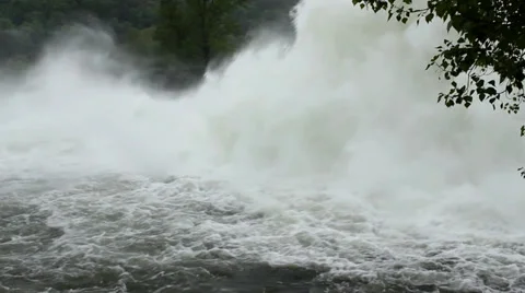 Discharged water from open dam flows and falls in the river,turbulent waves Stock Footage 37796630
