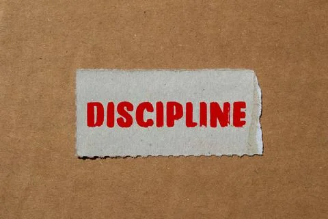 Discipline message written on ripped torn paper background. Conceptual Disc.. Stock Photos