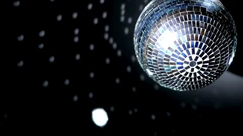 Disco ball on black background. Mirror ball spinning indoors. The reflection Stock Footage 265759082
