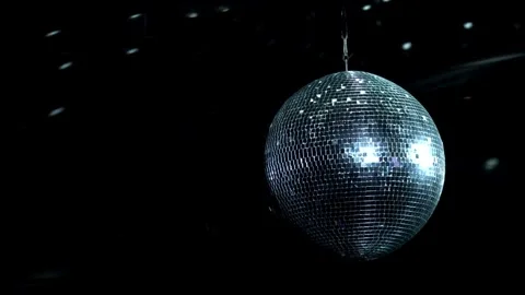 Disco ball on black background. Mirror ball spinning indoors. The reflectio.. Stock Footage 265760779
