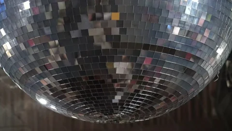 Disco ball with bright rays, night party with dark background. Party dance hall Stock Footage 148343770
