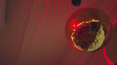 Disco ball on the ceiling, disco ball in the restaurant, golden discoshar Stock Footage 317696699