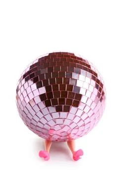 Disco ball with doll on white background. After party concept Stock Photos