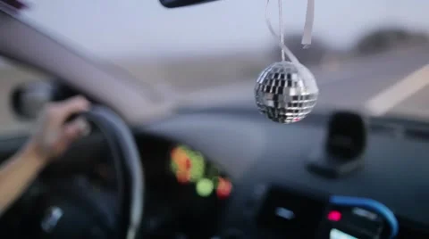 Disco ball hanging in the car Stock Footage 45221564