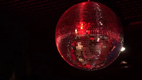 Disco ball mirror rotates and sparkles in different colors Stock Footage 72206814