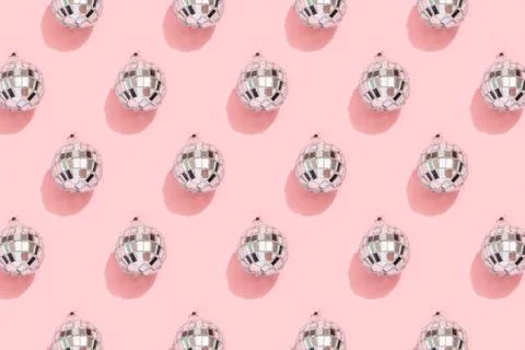 Disco ball pattern on pink background. 90s retro party concept. Stock Photos
