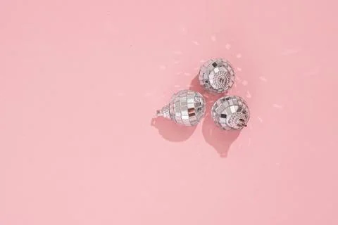 Disco ball pattern on pink background. 90s retro party concept. Stock Photos