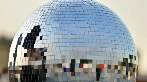 Disco ball reflecting light, creating a party and celebration atmosphere Stock Footage 344698591