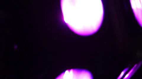 Disco ball rotating on the floor of a dark room Video stock 246926451
