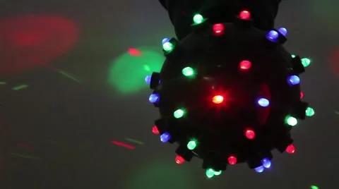 Disco ball rotating with green, red, blue lights Stock Footage 48434019