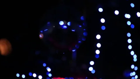 Disco ball sparkles blue as it turns in an underground jazz club. Stock Footage 83652434