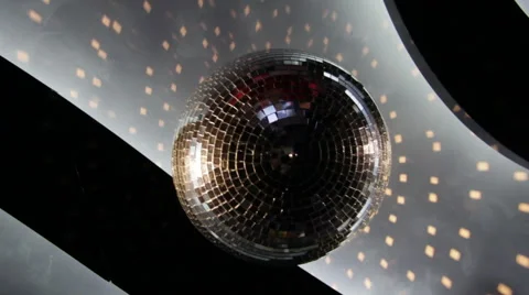 Disco ball spinning from the ceiling of a night club Stock Footage 61353081
