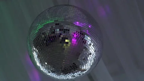 A disco ball is spinning Stock Footage 159882024