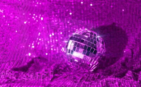 Disco ball on trendy background violet w sparkles and bokeh. Template holiday Stock Photos