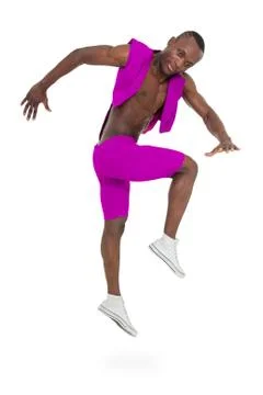 Disco dancer jumping against isolated white Stock Photos
