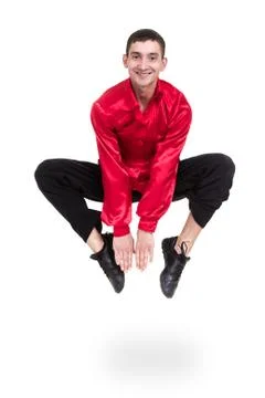 Disco dancer jumping against isolated white Stock Photos