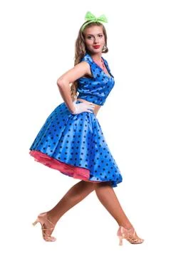 Disco dancer showing some movements against isolated white Stock Photos