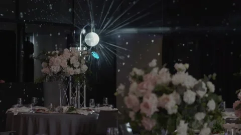 Disco layer on the background of wedding flower arrangements. Stock Footage 236058193