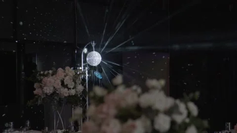 Disco layer on the background of wedding flower arrangements. Stock Footage 236058196