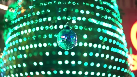 Disco Lights With Christmas Tree Lights Lit Up At Night In The Background Stock Footage 244762883