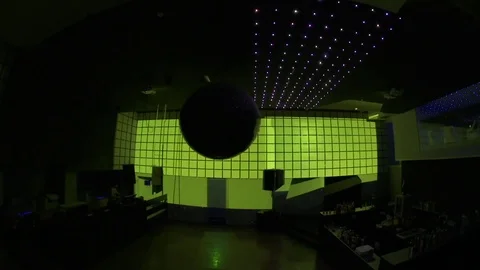 Disco lights flickering over dance floor and bar in nightclub Stock Footage 73021933