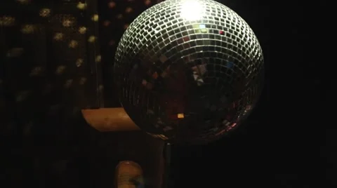 Disco mirror ball turning in darkness Stock Footage 60054803