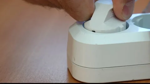 Disconnect from electricity. Pulls out the power cable from the socket. Stock Footage 144185936