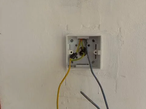 A disconnected power switch, a cable that goes out Stock Photos