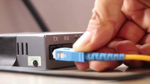 Disconnecting the fiber optic internet network Stock Footage 291595545