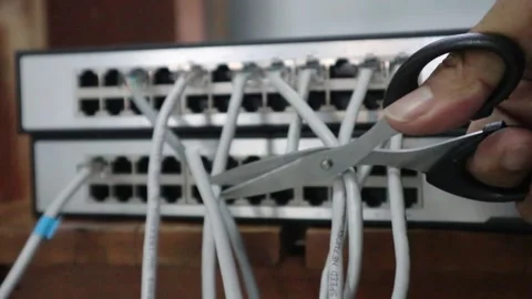 Disconnecting a internet network cable 動画素材 333871153