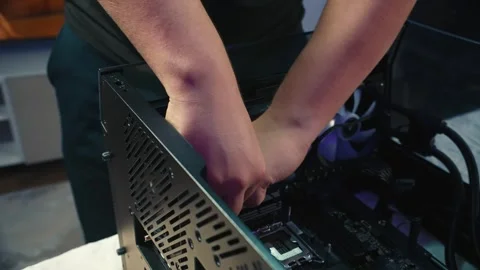 Disconnecting power cables from processor inside computer case Stock Footage 328984705