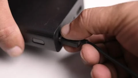 Disconnecting USB Type A Cable from Power Bank Stock Footage 340611084