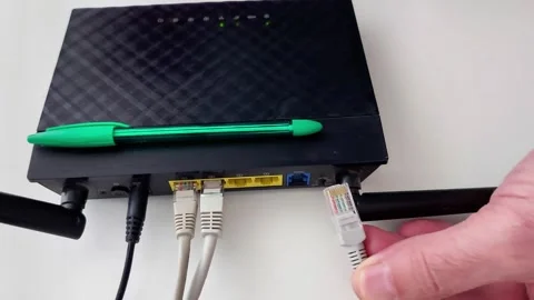 Disconnection Cable into Wireless Router for Network Setup Video stock 330631828