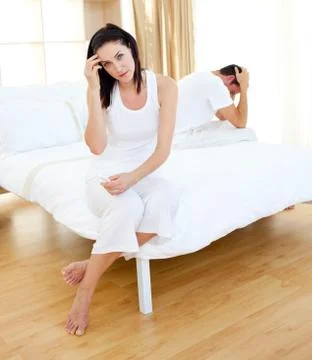 Disconsolate couple finding out results of a pregnancy test Stock Photos