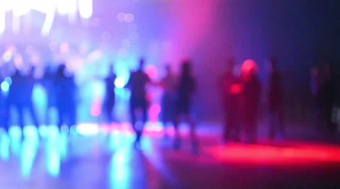 Discotheque, people dancing during disco party under colorful lights. Stock Footage 34848172