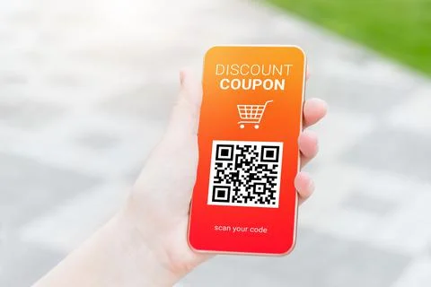 Discount coupon with QR code on smartphone Stock Photos