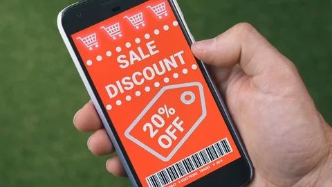 Discount Coupons Vouchers Being Swiped on a Smartphone Screen Stock Footage