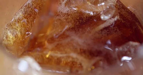 Discover the art of creating the perfect iced tea with vibrant colors and Video stock 313612533